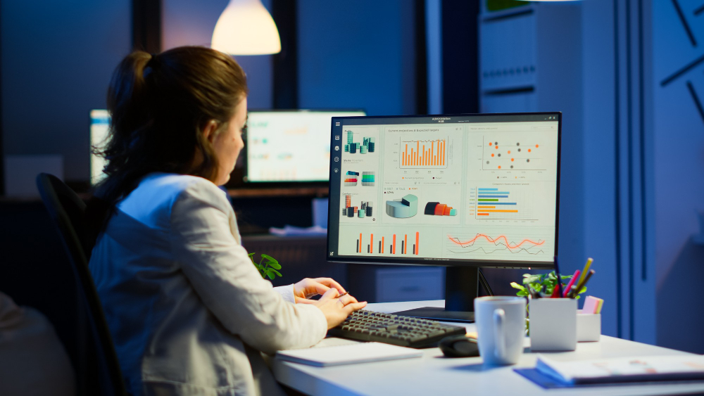 A woman refining the data by researching it in hope of refining the content through data led optimisation