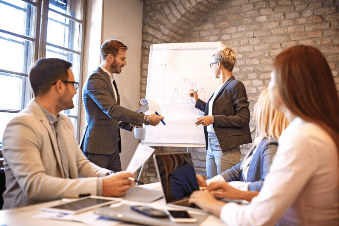 manager describing to team how micro-moments are affecting the consumer journey map