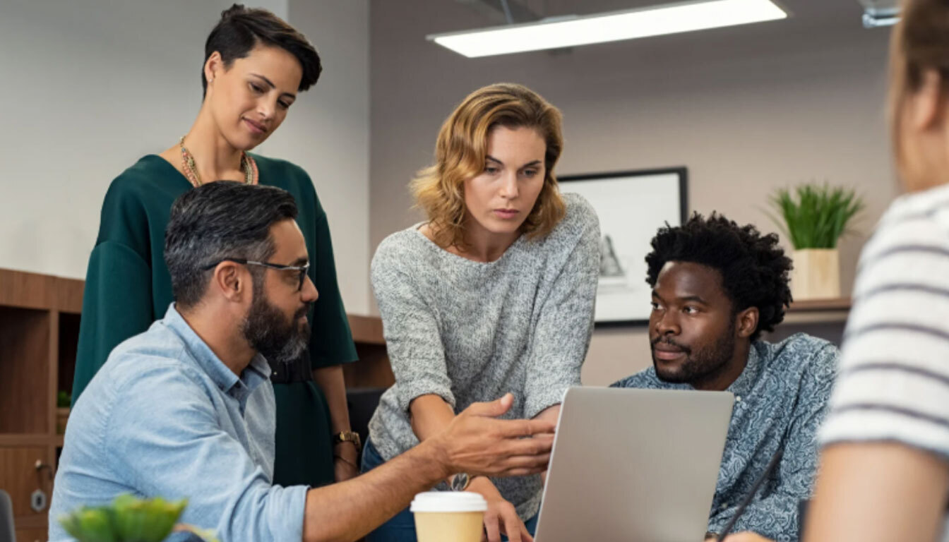 Creative retail team collaborating on an AI shopping assistant integration strategy.